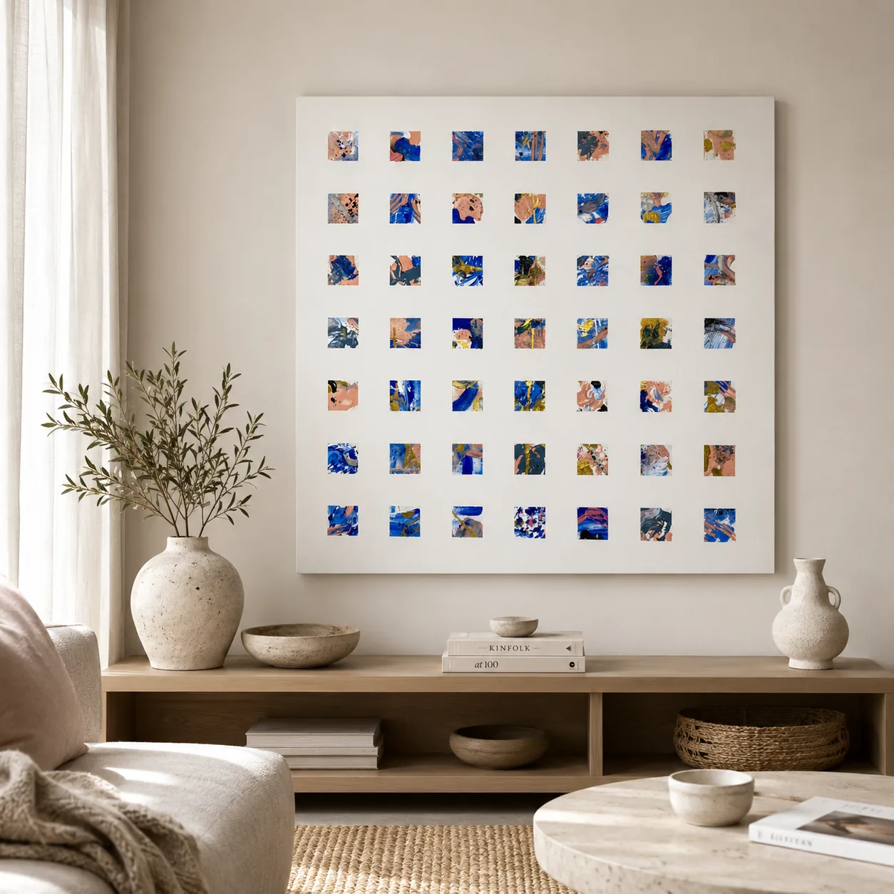 Original abstract canvas grid painting in cobalt blue, coral and ink on a white wall